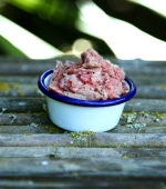 A bowl of Everything Dog Ultimate Beef Medallion Raw Dog Food Grind